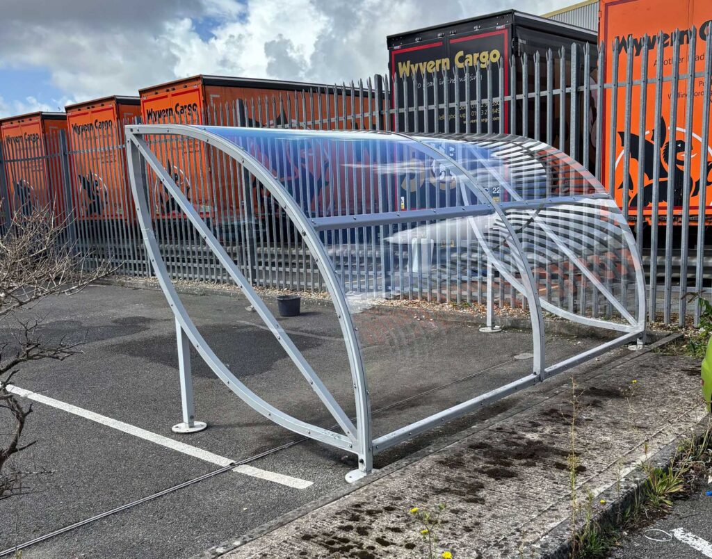 smoking shelter that has been fully repaired to look like new